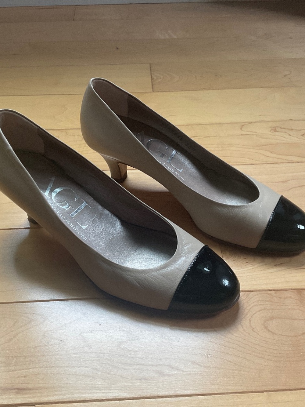AGL Tan Leather Black Cap Rounded Toe Pump size 5.5 Made in Italy.  2” heel.